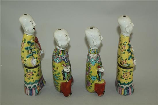 Four Chinese enamelled porcelain figures of the He He Erxian, late 18th / early 19th century, 17cm and 20.5cm